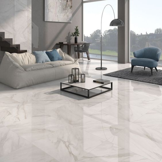 Calacatta white gloss floor tiles have a stylish marble effect finish in either grey or beige. These large white tiles are made from quality porcelain and are an attractive, hardwearing option for any home. Please contact Direct Tile Warehouse for help with choosing white floor tiles.