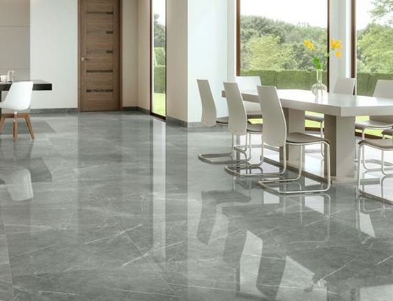 Beautifully polished charcoal grey porcelain tiles with intricate white veining. A classic tile that is so pretty that many believe it looks better than real marble.