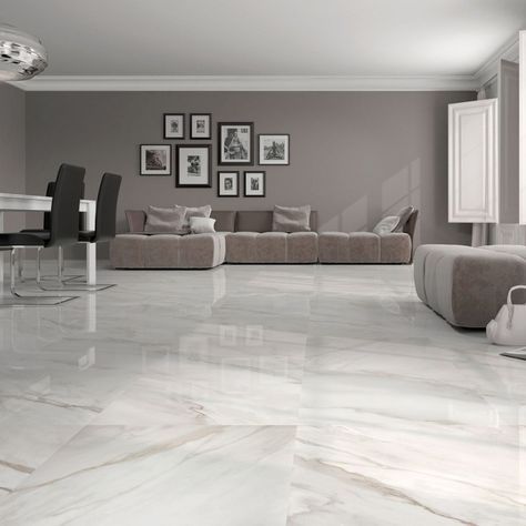 Calacatta white gloss floor tiles have an attractive marble effect finish. These large white floor tiles are made from premium quality porcelain and will look fabulous throughout the home. Please contact Direct Tile Warehouse for help with choosing white floor tiles.