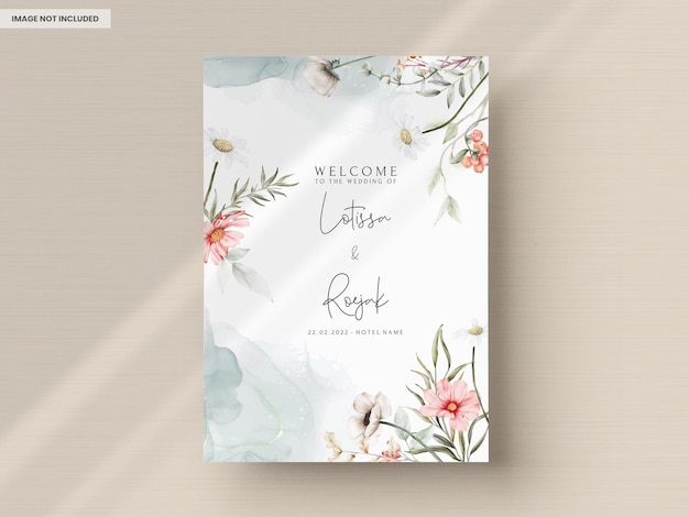 Beautiful watercolor wedding invitation card with elegant flower and tiny foliage